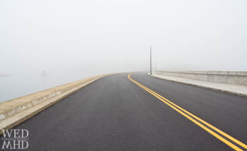 A New Causeway Draped in Fog