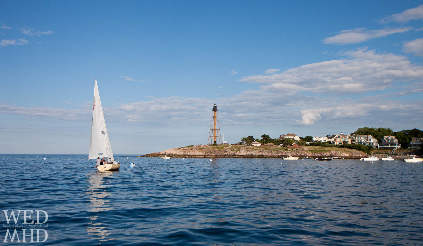 sailboat and lighthouse
