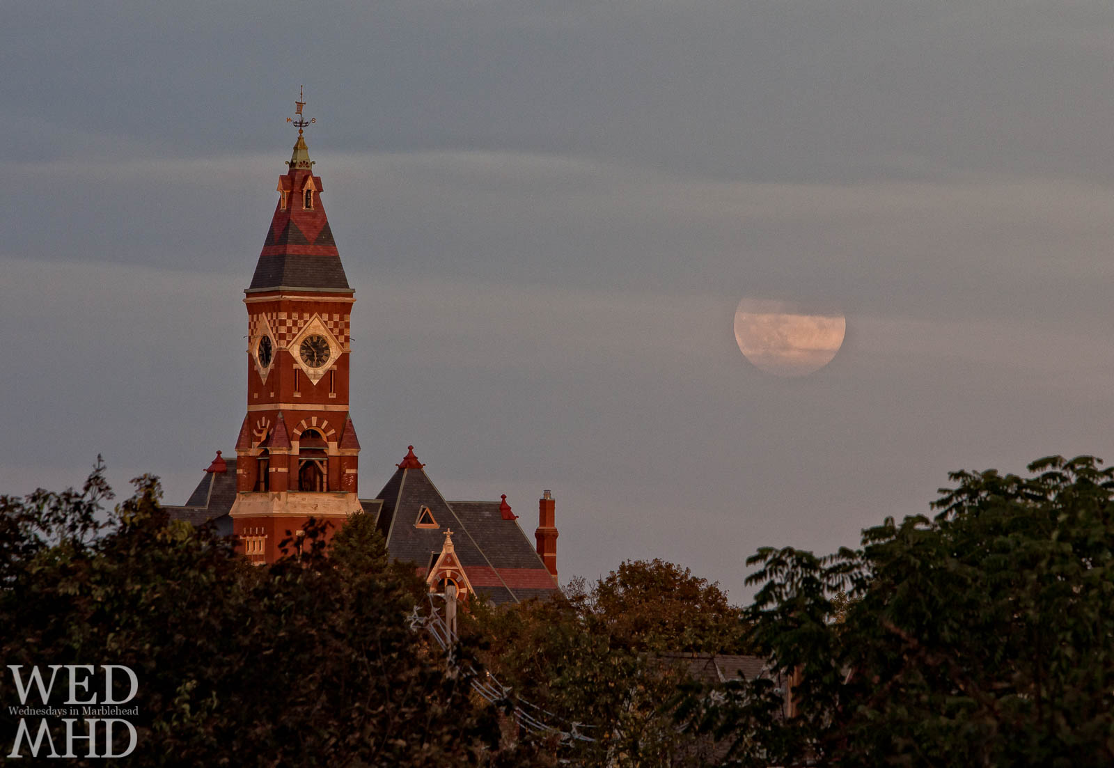 Harvest moon rising near Abbot Hall