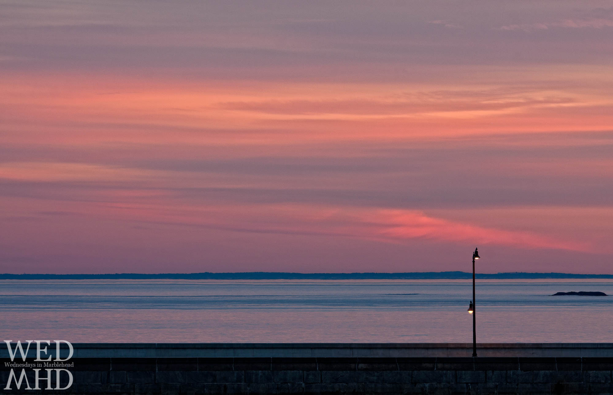 The sun sets over the causeway
