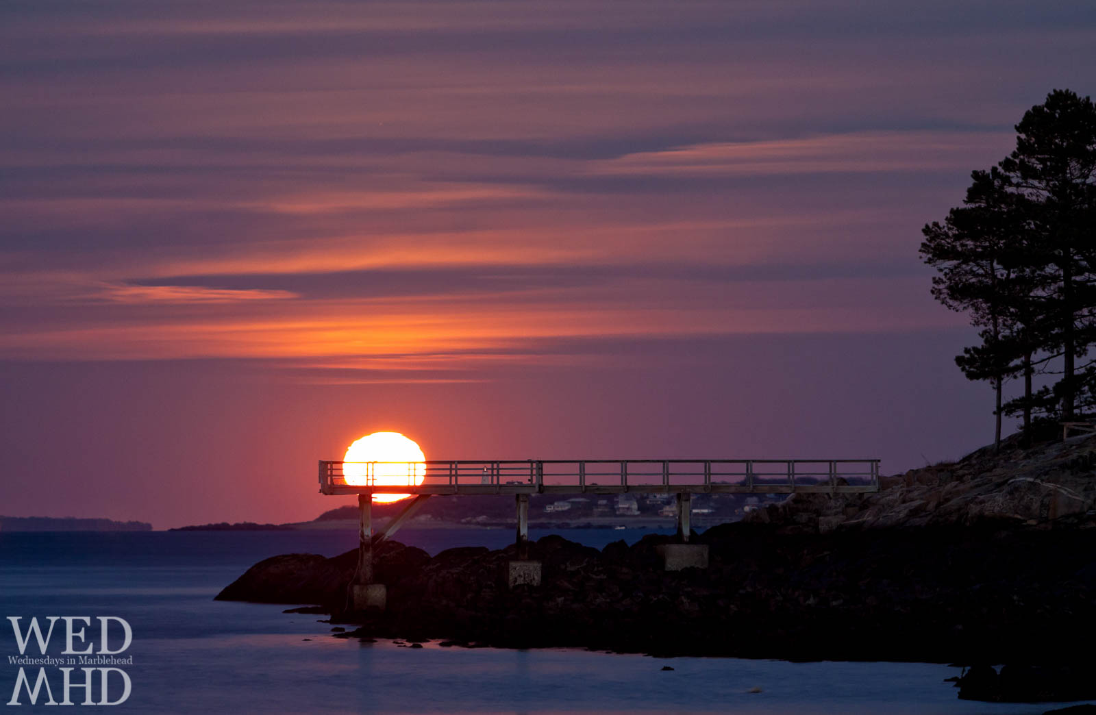 The Wolf Moon Rises over the Pier