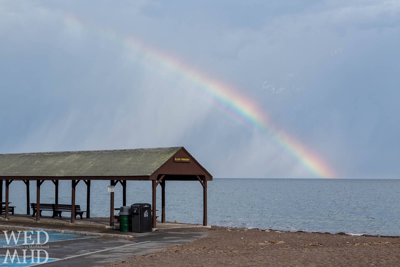 Rainbows over Devereux Beach