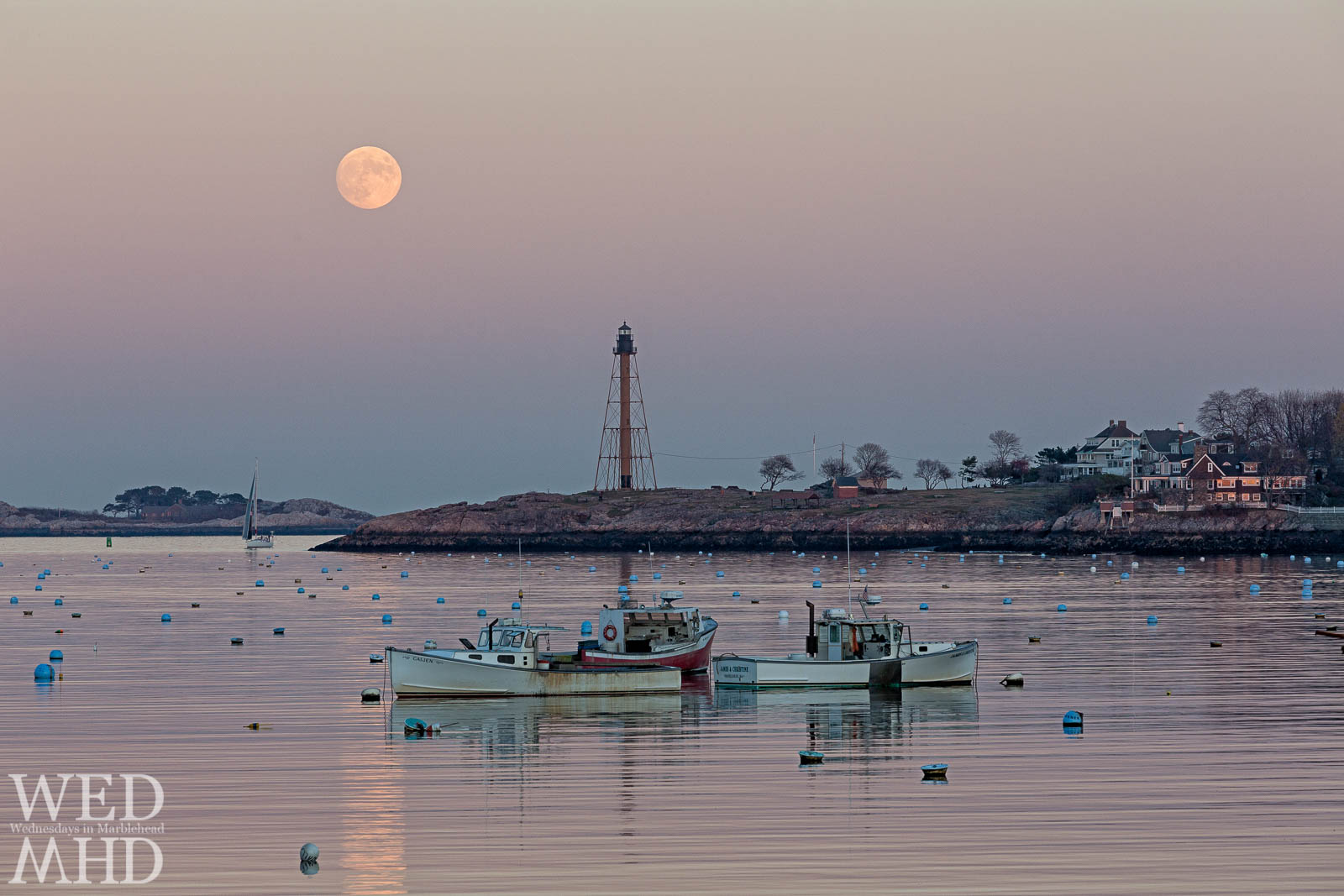 moonrise over lobster boats