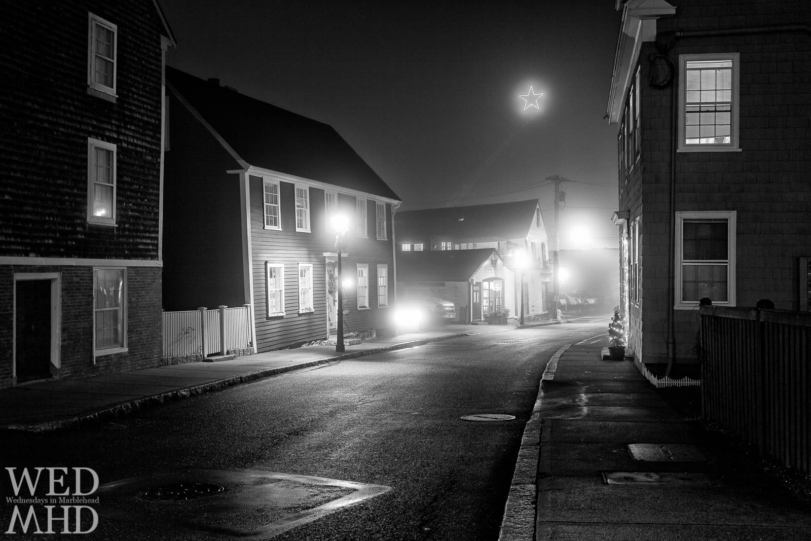 foggy night on State Street with bright star in sky