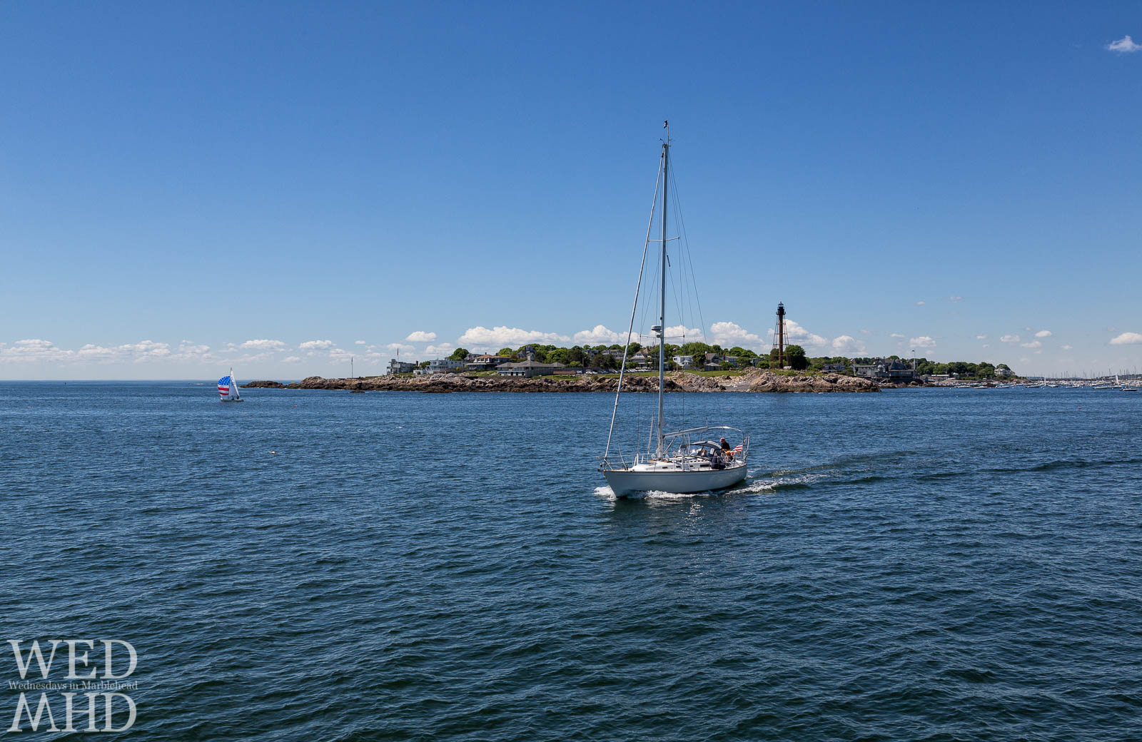 Sailboat leaving Marblehead harbor