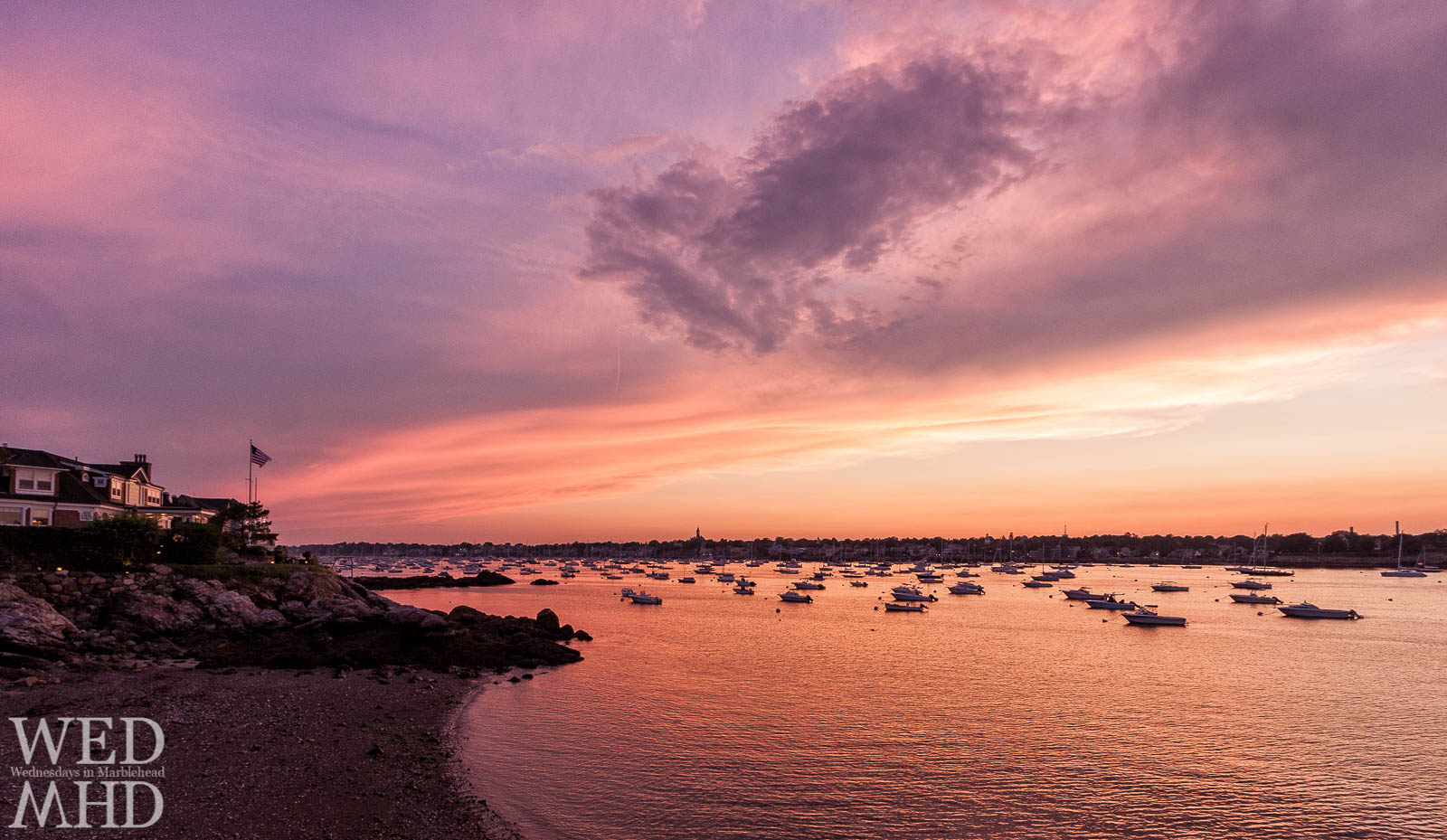 A purple sunset is captured on a warm Summer night in Marblehead