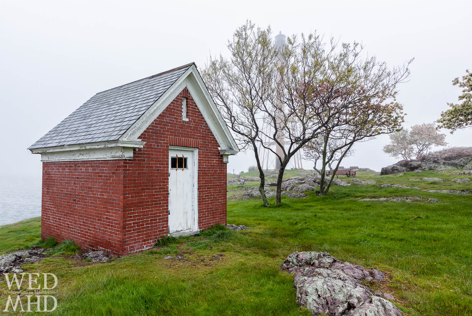 The old oil house on Chandler Hovey Park seen on a foggy Spring day