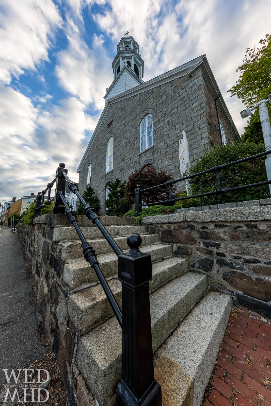 At the foot of the stairs of Old North Church in Marblehead