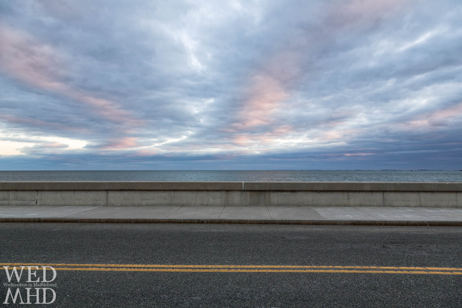 A view of the causeway at sunset caps off a busy New Years day in Marblehead