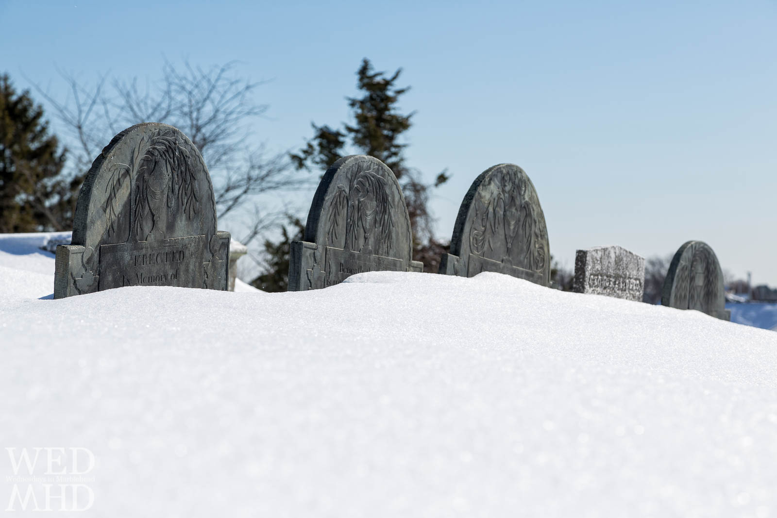 Gravestones serve as snow measuring tools at Old Burial Hill