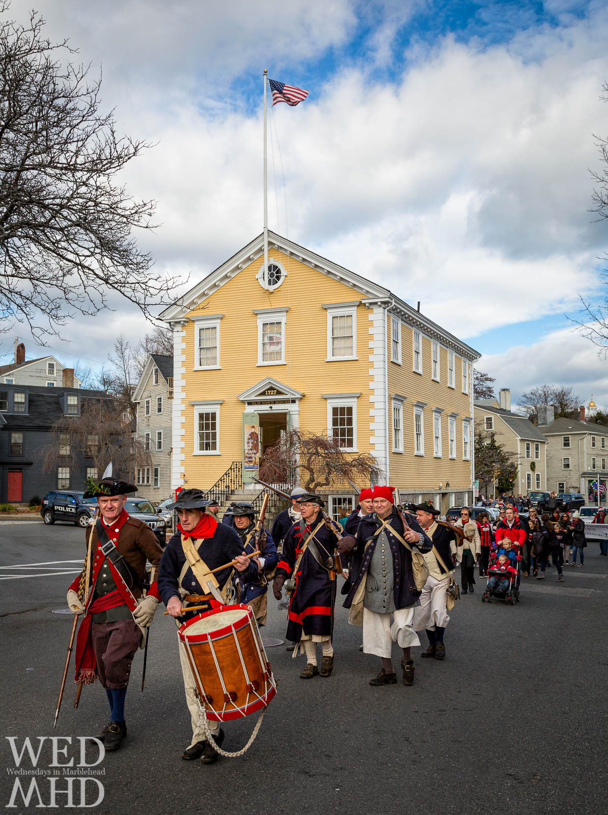 Glover's Regiment leads the annual Marblehead Christmas Walk Parade along Washington Street past Old Town House