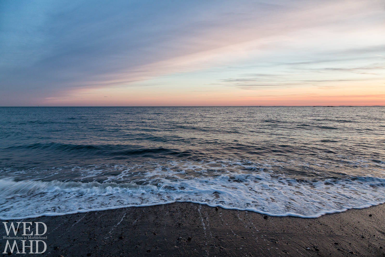 The angle of clouds and horizon creates a fifteen degree sunset on a January evening that was much warmer than it appeared