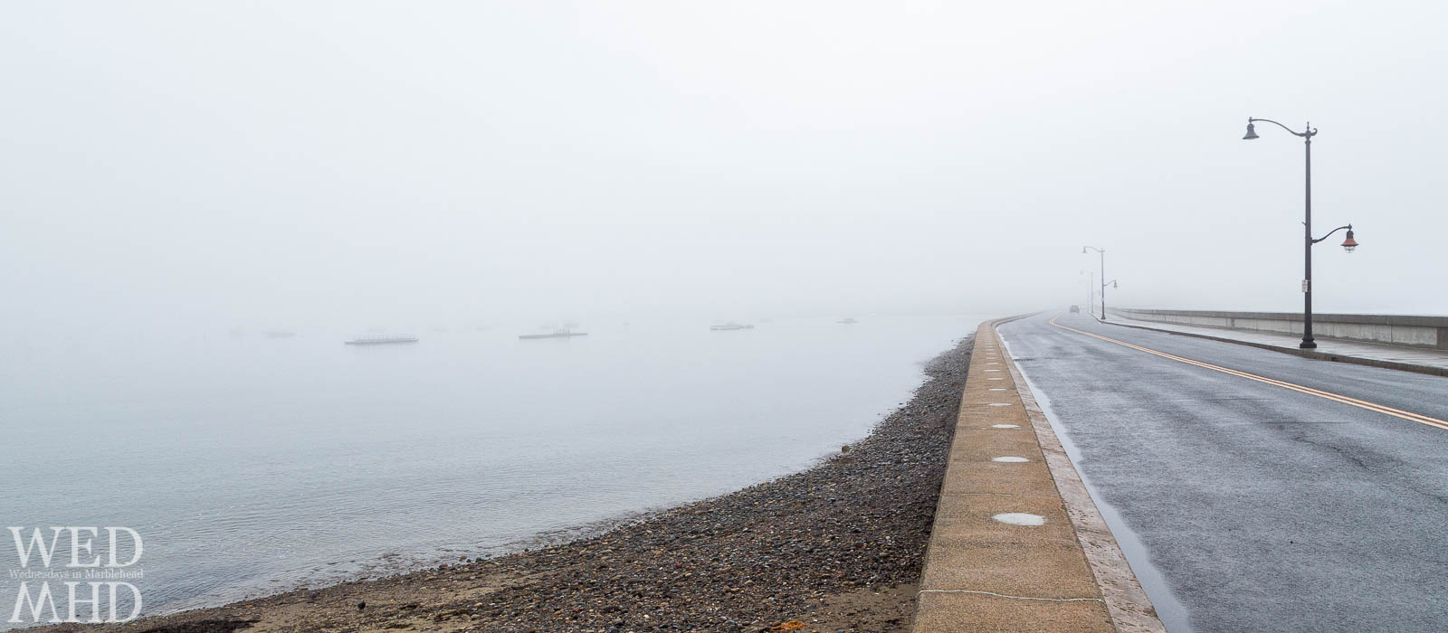 Looking at the causeway on a foggy day with the harbor on the left creates a different perspective on a familiar scene