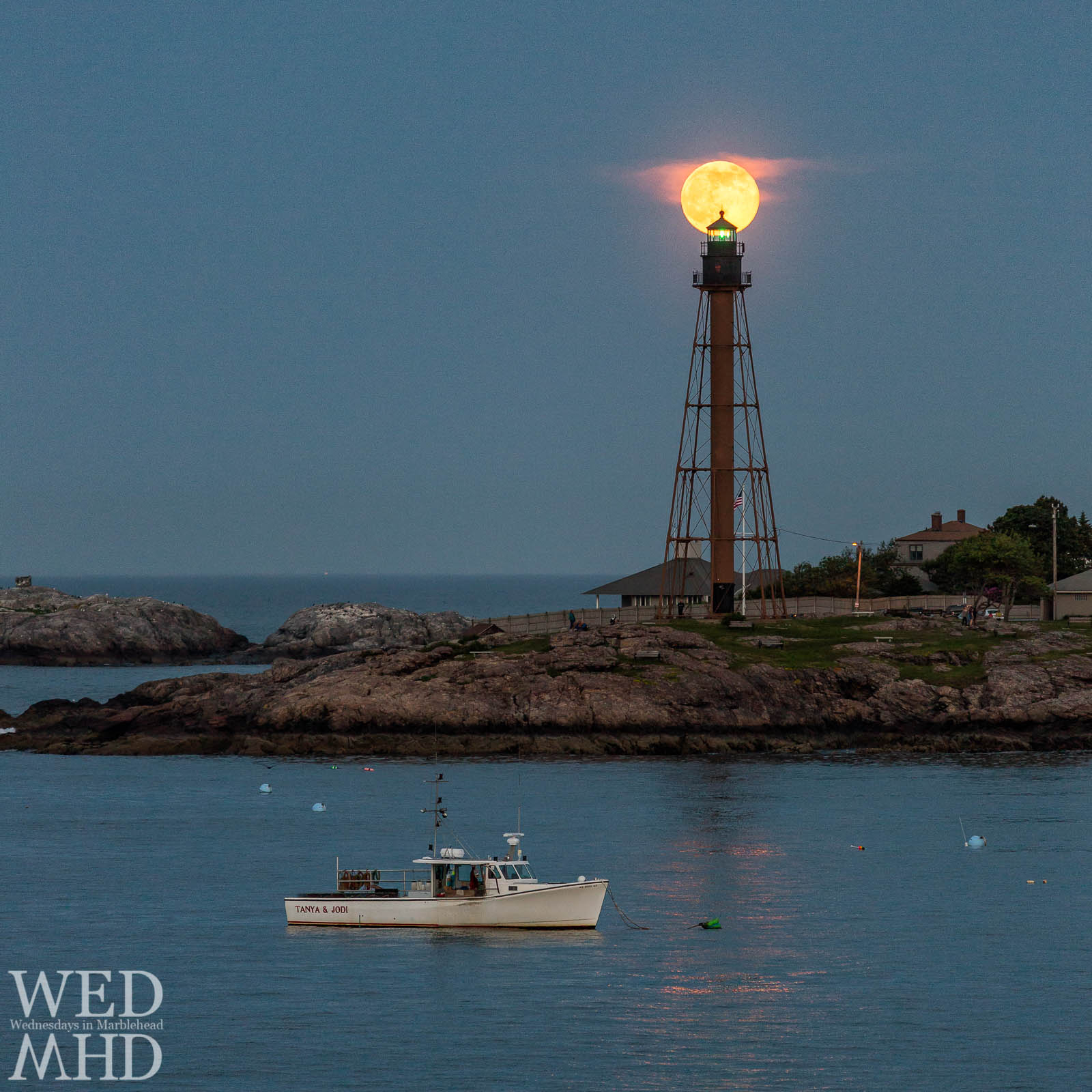 As the full moon rises, Marblehead light becomes moonstruck at Chandler Hovey Park