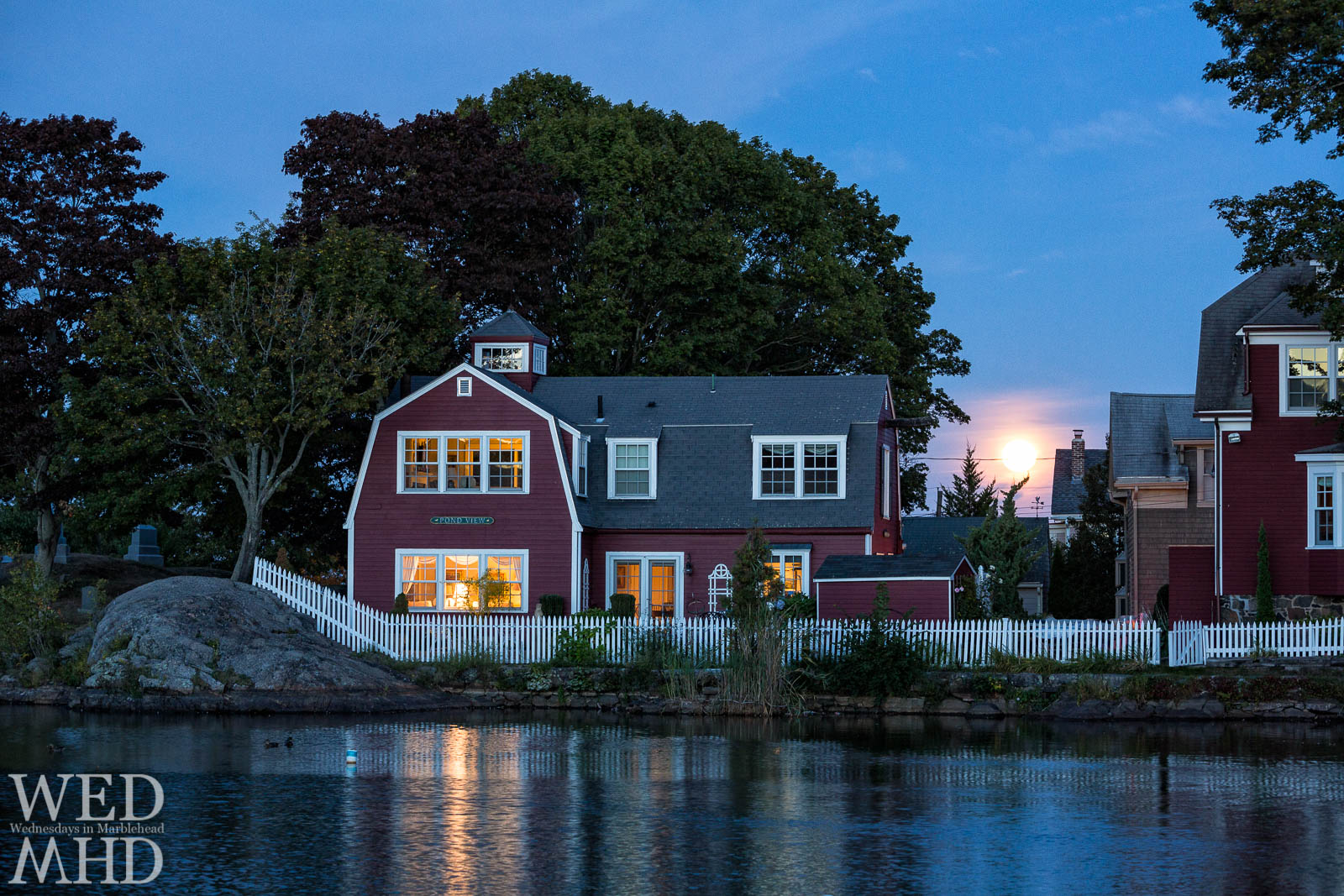 All the lights are on at Pond View as the full moon rises