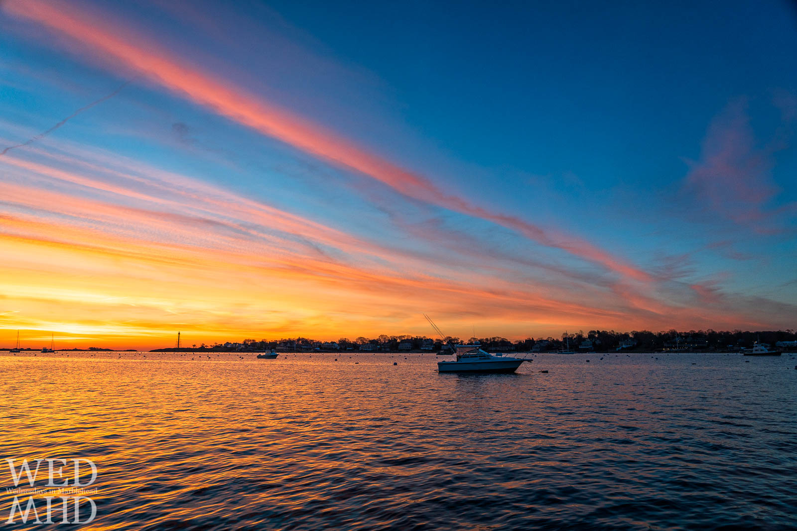 Streaks of light paint the sky at dawn during a long sunrise that took play in late April