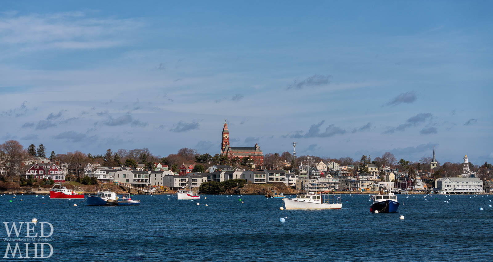 Five working boats fill the otherwise empty moorings in Marblehead Harbor