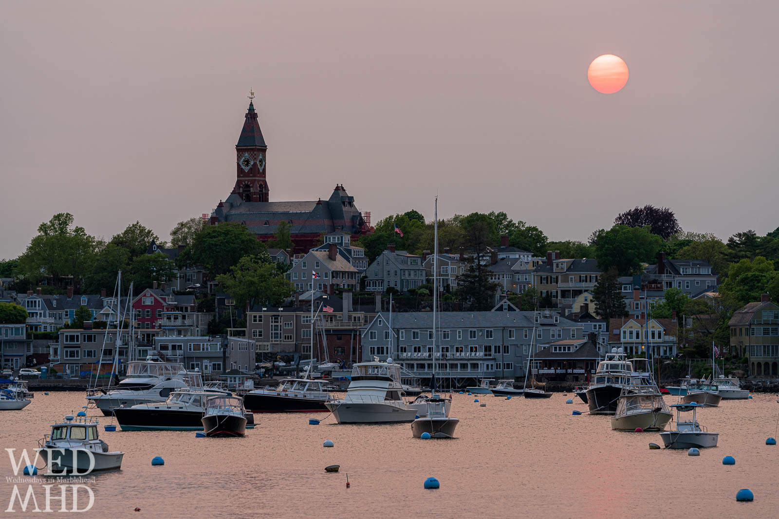 A red sun at night signals the end of May and welcomes a warmer month of weather in Marblehead