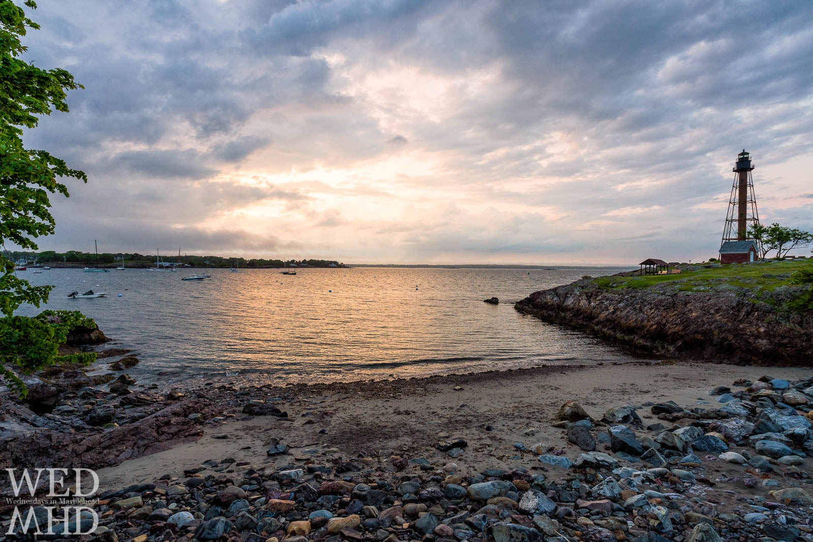Cove Beach at the end of Cove Lane is quiet on a June evening as the sun casts a golden light on its shore