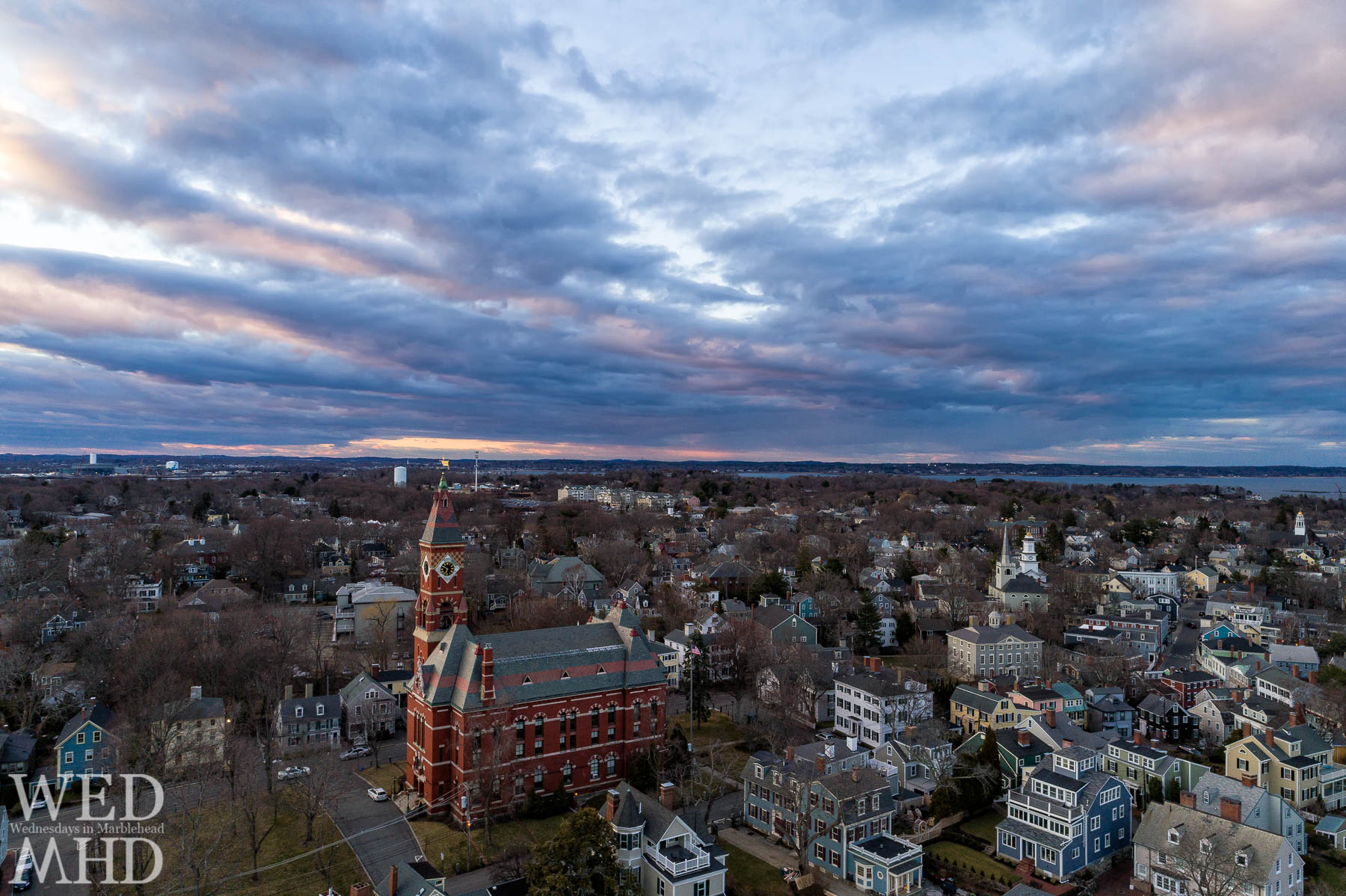 A view of Abbot from above captured at sunset on a late March evening shows the building without its temporary construction and the proximity of houses and other familiar landmarks